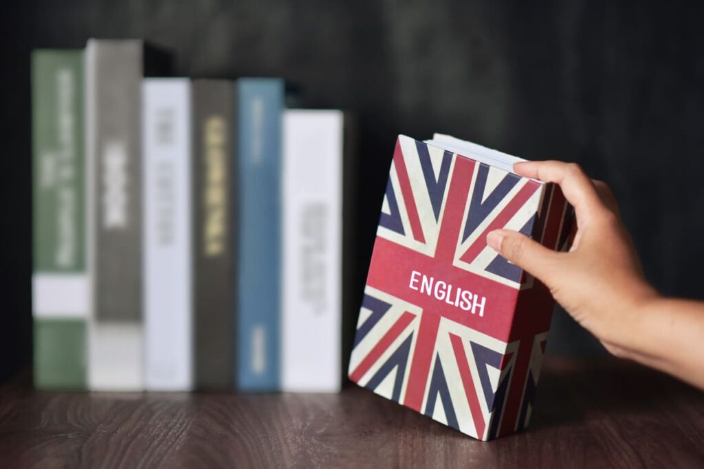 Livro em inglês com seleção manual da estante